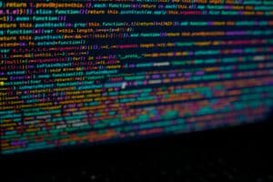 Colorful computer code displayed on a screen, representing API documentation, software development, programming, and application programming interface technology.