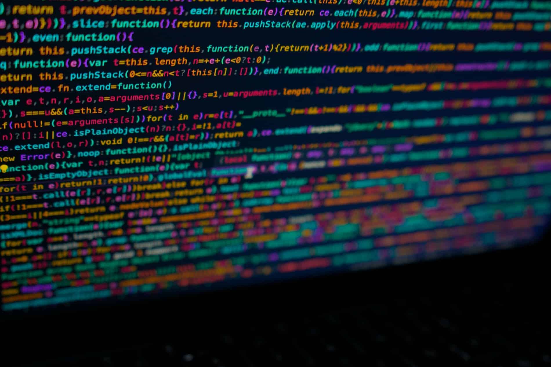 Colorful computer code displayed on a screen, representing API documentation, software development, programming, and application programming interface technology.